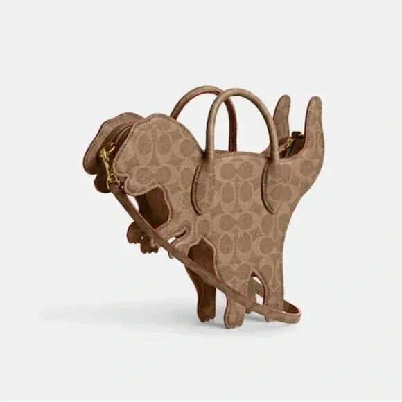 Coach Handbags - Coach Rexy Runway Bag Leather Signature Canvas Dinosaur Purse Tan NWT